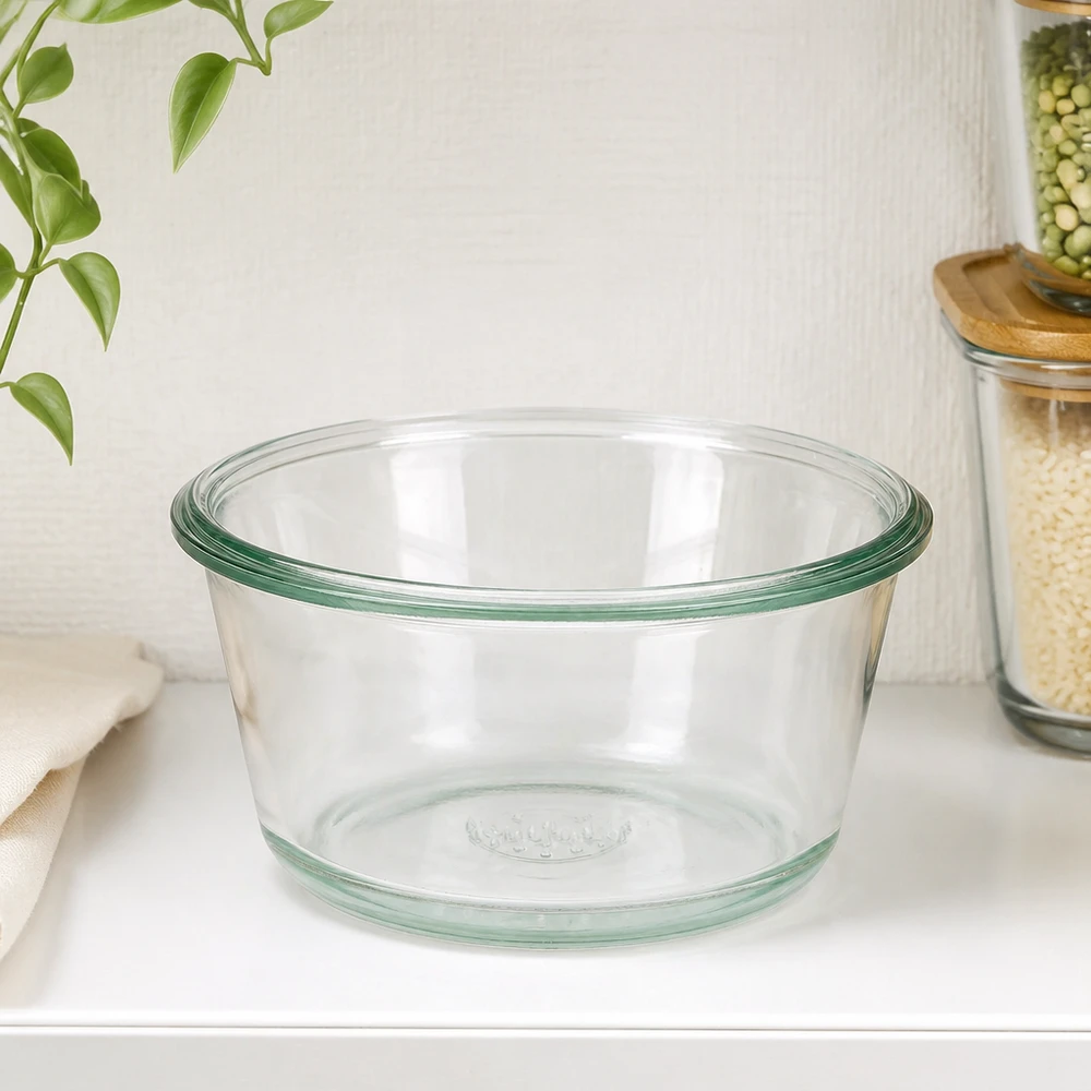 WECK RR100 290ml gourmetpot leeg op wit keukenblad naast voorraadpotten en groene plant